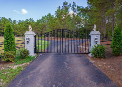Gate of a custom 4-bedroom home at 348 Countryside Dr, Lexington, TN
