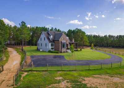 Wide-angle shot of a luxurious 4-bedroom home by Walker Auctions
