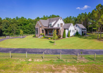 Wide-angle aerial shot of a luxury estate by Walker Auctions